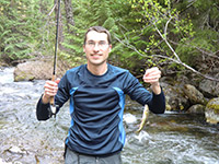 Jason with a Freshly Caught and Soon to be Released Redband Trout