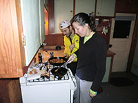 Matt and Kara Cooking Dinner