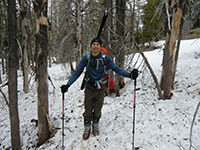 Jason with Skis on Pack