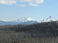 Broken Top, Three Sisters, and Mt Washington from above Martin Lake