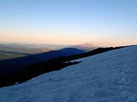 Shadow from Mt Adams at Sunrise with Mt Saint Helens in the Background