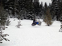 Jason Getting Some Air on Snowmobile