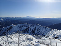 Snow Covered Ridge with Mt Adams in the Distance