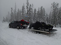 Snowmobiles Loaded up Ready to Go Home