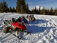 Snowmobiles at High Prairie with Mt Hood in the backgrond