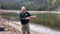 John with a beautiful rainbow trout