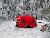 Eskimo FatFish 6120I being used as a hot tent with a Four Dog wood stove