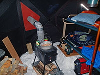 Cooking dinner over the wood stove