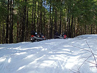 Snowmobiling on road 4697 towards Elk Lake