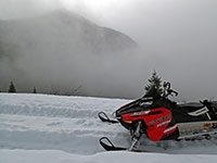 Rain and wet concrete snow make for terrible snowmobiling