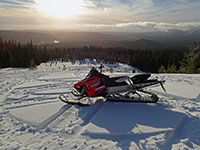 Snowmobile hill play on the back side of Frog Lake Buttes