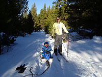 Julian sledding and me skiing