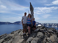 Family portrait with Crater Lake in the background