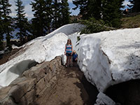The snow is deeper than Katie and Julian