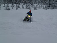 Kevin playing around on his 2018 Arctic Cat snowmobile