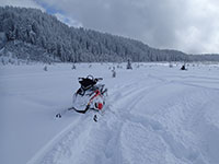 Snowmobiling up the Muddy River Lahar