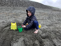 Julian playing in the sand